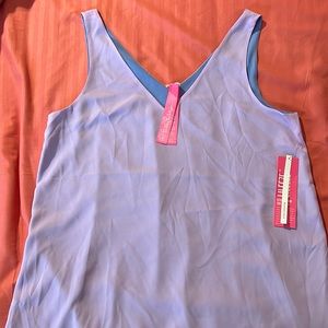 Brand new reversible thin strap blouse. Two tone.